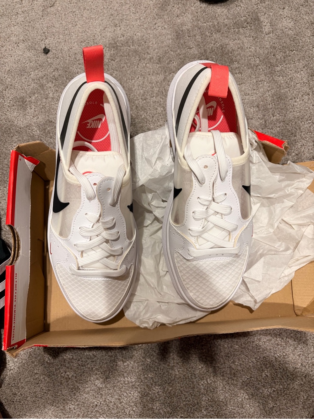 Nike Women’s White Sneakers with Red and Black Accents
